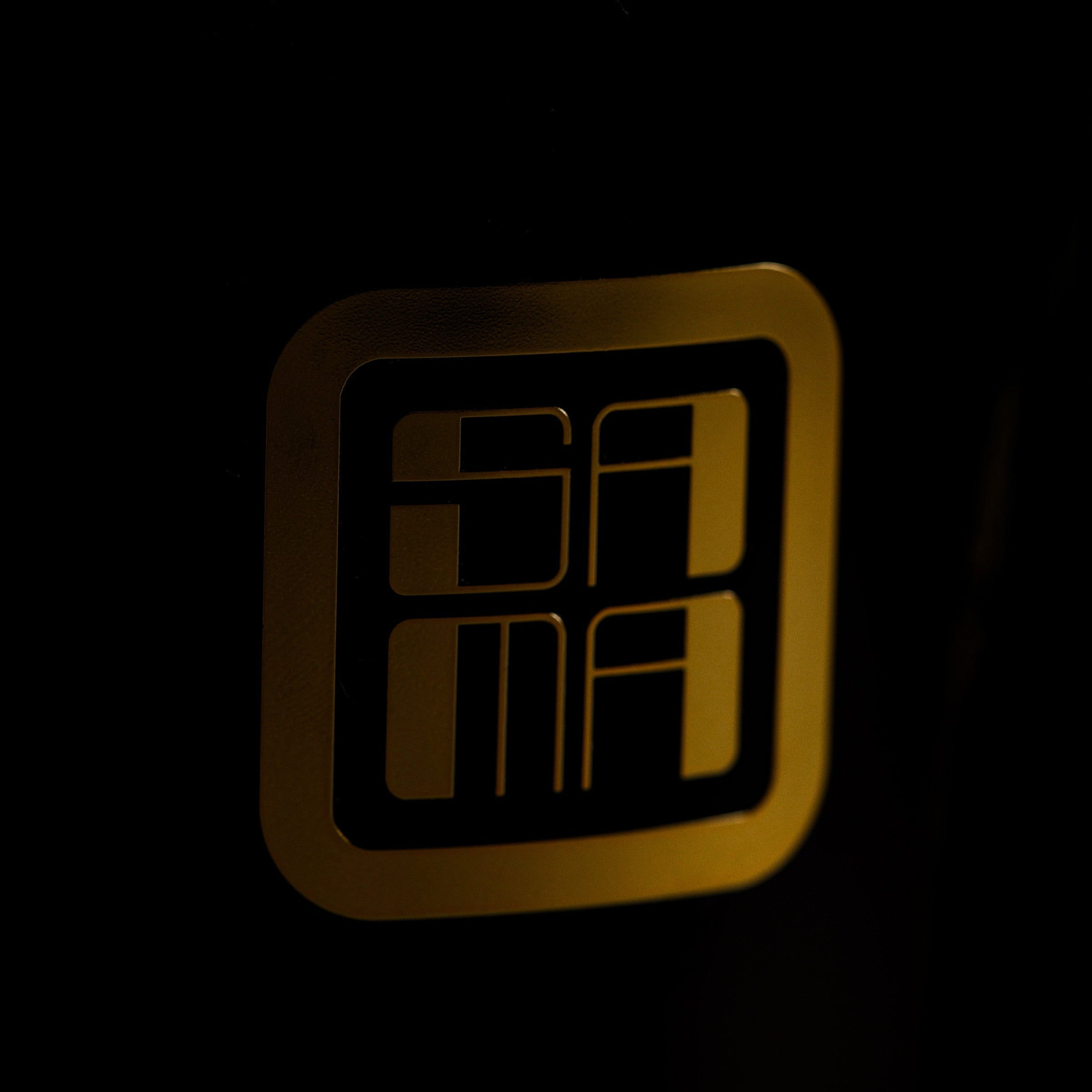 Gold logo on a black background